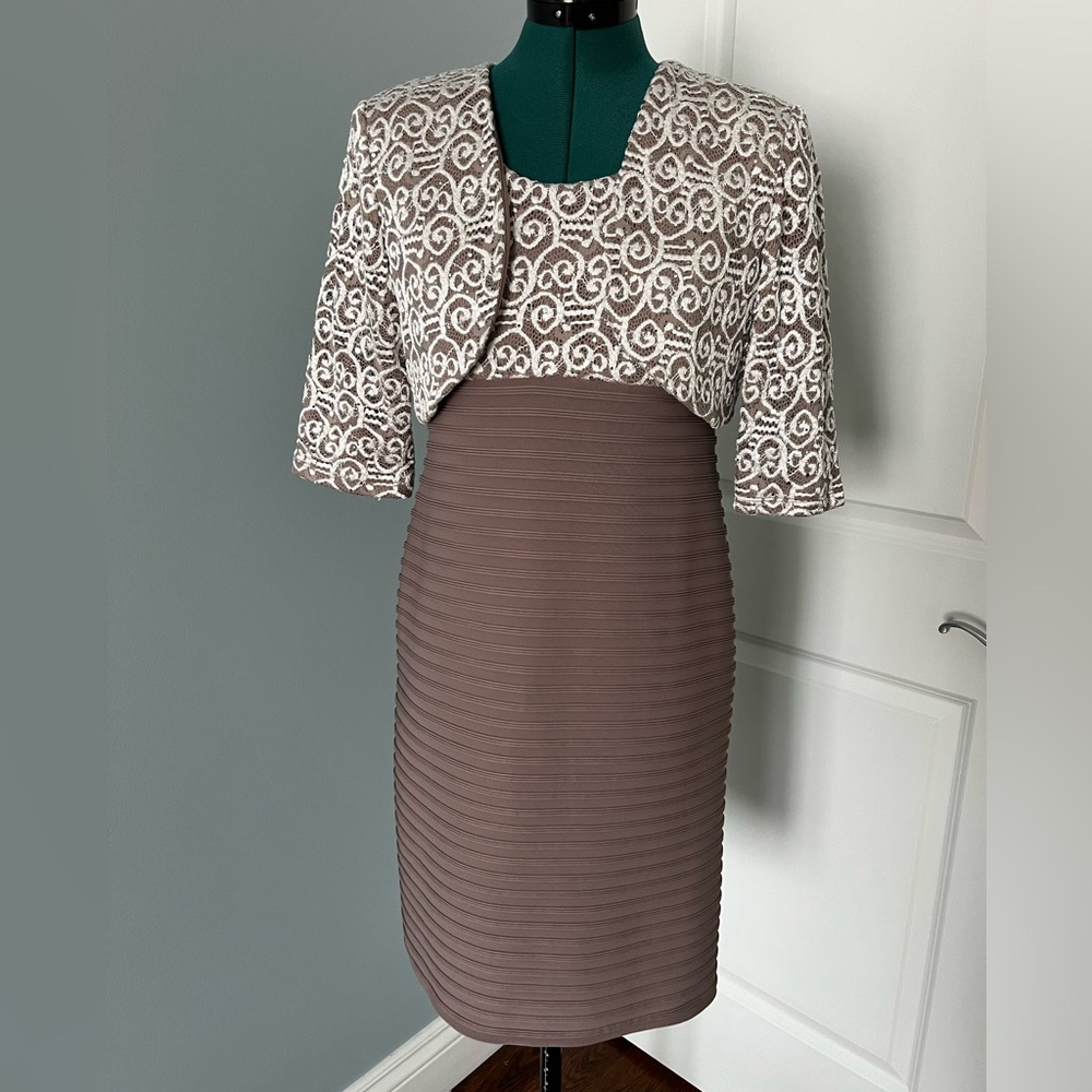 Elegant women’s dress with assorted cardigan. Perfect for special event